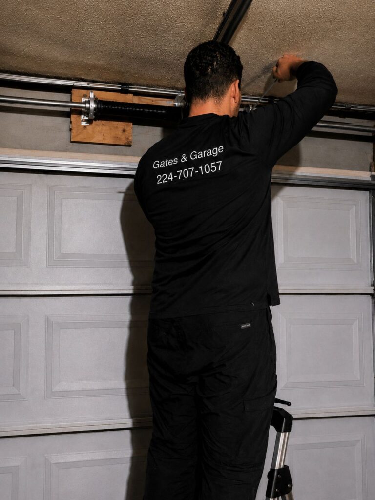 Emergency garage door cable replacement and spring adjustment service performed in Deerfield, Illinois.